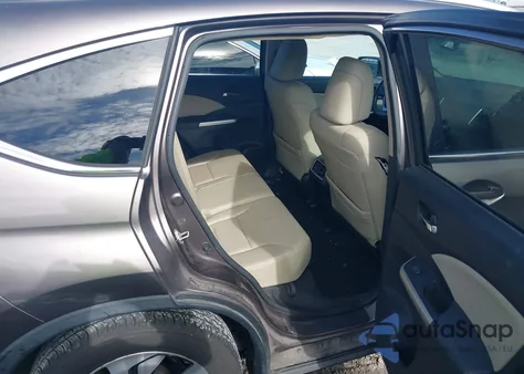 2016 Honda Cr-V Touring z USA, uszkodzony, nr VIN 5J6RM3H97GL004260